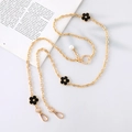 Detail of gold metal chain strap featuring black enamel flowers and a white pearl charm - K3217 Detachable Metal Smiley Chain Black / Long Style