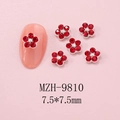 Macro view of 7.5mm red crystal flower nail charms with white rhinestones on tips - Red Rhinestone Flower Silver Base (9810) / 1 Piece