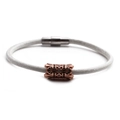 Detail of white leather braided bracelet with rose gold zircon bead and magnetic clasp - White