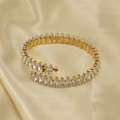 18K gold plated stainless steel open bangle with marquise zircon on champagne silk - White