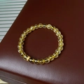 Beaded yellow crystal bracelet with gold-plated spacer charm on leather display - 47# Bracelet-Gold-Yellow (Citrine Micro Pave)