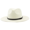 Classic straw fedora hat with black rivet band and gold buckle on white background - Cream