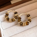 Macro shot of gold hoop earrings with brown tiger eye beads and textured metal spacers - 15# Ear Buckle - Gold & Coffee