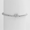Minimalist silver beaded stretch bracelet featuring a polished letter V charm for women - Silver V
