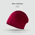 Slouchy burgundy knitted beanie hat in soft breathable fabric for women's casual style - Solid Minimalist Style / Burgundy