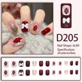 Burgundy press-on nails set with glitter accents and 3D bow charms on quilted pattern - Burgundy Rhombus White Bow (D205)