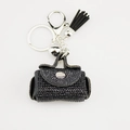 Detalle de llavero de minibolso con diamantes de imitación negros y borla plateada - Negro