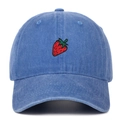 Close-up of a vintage washed blue baseball cap with detailed red strawberry embroidery - Light Blue