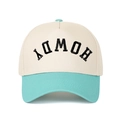 Macro detail of 3D HOWDY embroidery on two-tone cream and blue baseball cap fabric - Beige/Lake Blue