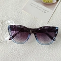 Chic cat-eye sunglasses with transparent purple frames and gradient blue lenses - Blue Gradient