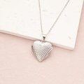 Silver heart locket necklace with embossed grid pattern on textured stone background - Steel Shimmer Waves (29*29mm)