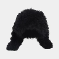 Detailed close-up showing the soft texture of black faux fur plush trapper hat material - Black