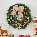 Christmas wreath 40cm with white deer, beige bow, and golden ornaments on white wall - Type D Christmas Wreath