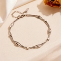 Close-up of double-layer silver stainless steel bracelet with beads on silk background - Steel Double Layer Rounded Cube Bead Bracelet (N502)