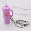 Purple silicone tumbler keychain with a pink butterfly charm and silver hardware - Purple Butterfly Cup Keychain