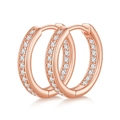 Detail of rose gold hoop earrings featuring meticulous moissanite pavé settings - Rose Gold