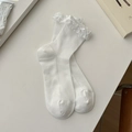 White cotton ribbed crew socks with lace trim and bow accent for a sweet feminine style - One Size / White Slouchy Tube