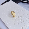Macro shot of 18K gold plated ring with triple-row cubic zirconia on stone base - Style 4-Matte Three-row Zirconia