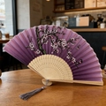 Classic purple folding fan with elegant cherry blossom patterns and gray tassel - Style 53 (New Style)
