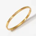 Bracciale rigido minimalista in acciaio inossidabile dorato a onde con zirconi lucidi - Oro (KA1196)