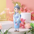 Cute resin girl figurine in blue kimono with white cat on head for home decor - Small Figurine Holding Bag (1136-4B)