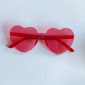 Translucent red heart-shaped rimless sunglasses with integrated one-piece design - Rose Pink