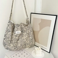 Detail of paisley pattern cotton tote bag next to home decor items on a table - Beige Ethnic Style