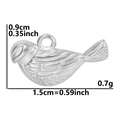 Macro shot of silver bird pendant with detailed size measurements 1.5cm by 0.9cm - Bird Pendant / Silver/Steel