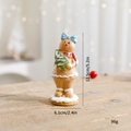 Resin gingerbread man with blue bow holding a green Christmas tree ornament, 12.5cm height - Small Gingerbread Man - Christmas Tree