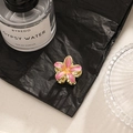 Bohemian floral hair claw in pink enamel finish with golden metal base for women - Purple