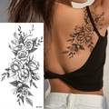 Sketch style black rose temporary tattoo sticker BK-022 shown on a model's back - Pattern BK-022