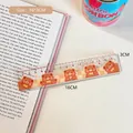 Transparent acrylic 15cm ruler featuring a cute brown bear design on a book - Coffee Bear