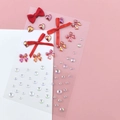 DIY decorative face gems with red ribbon bows and iridescent butterfly rhinestones - Red Bow Rhinestones (BJA-652)