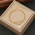 Detail of gold chain bracelet featuring a heart crystal pendant and lobster clasp closure - 7# Crystal Heart (B496)