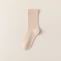 Soft apricot cotton blend crew sock featuring a classic ribbed cuff on a beige background - Khaki