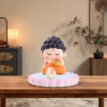 Cute violet hair Buddha figurine with gold ingot on lotus base sitting on wooden table - Buddha Hand Luck (1081-17)