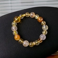 Bracelet en perles de cristal fluorite avec intercalaires en zircon doré sur présentoir - 66# Jaune