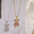 Detail of bear pendant with white and pink rhinestones on a gold-plated chain necklace - Pink and Purple Rhinestone Bear (23659)