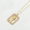 Macro detail of golden rectangular pendant with classical relief and clear zircon stones - Mona Lisa