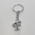 Sleek silver metal keychain featuring a minimalist letter F pendant on a sturdy ring - Letter F / Silver