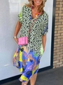 Detail of colorful mixed print dress showing green leopard and blue tropical patterns - S / Tops / Green