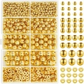 Golden DIY jewelry making kit featuring various sizes of round beads and flat spacers - 10-Grid Gold Spacer Beads Set