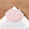 Pale pink faux leather smile face corner bookmark with white stitching for books - Pink