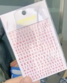 Close-up of pink 3D alphabet nail art stickers model WG719 with varied letters - Pink (WG719)