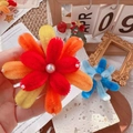 Handmade plush flower brooch with orange and red gradient petals and pearl detail - Orange-Red Fireworks Fridge Magnet / One Size