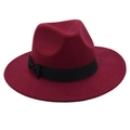 Close-up of deep red wool fedora hat featuring a black decorative ribbon and bow detail - One Size / Burgundy