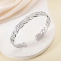 Bracciale rigido aperto argento con trama intrecciata in acciaio inossidabile - Acciaio