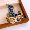 Golden hollow ring bracelet featuring multi-colored floral silk ribbon insert for women - Gold Floral Multicolor Scarf Bangle