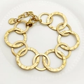 Gold-plated stainless steel bracelet featuring interlocking hammered and smooth links - Hammered Mixed Rings