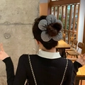 Elegant black and white plaid floral scrunchie hair tie on model bun hairstyle - Black & White Small Plaid